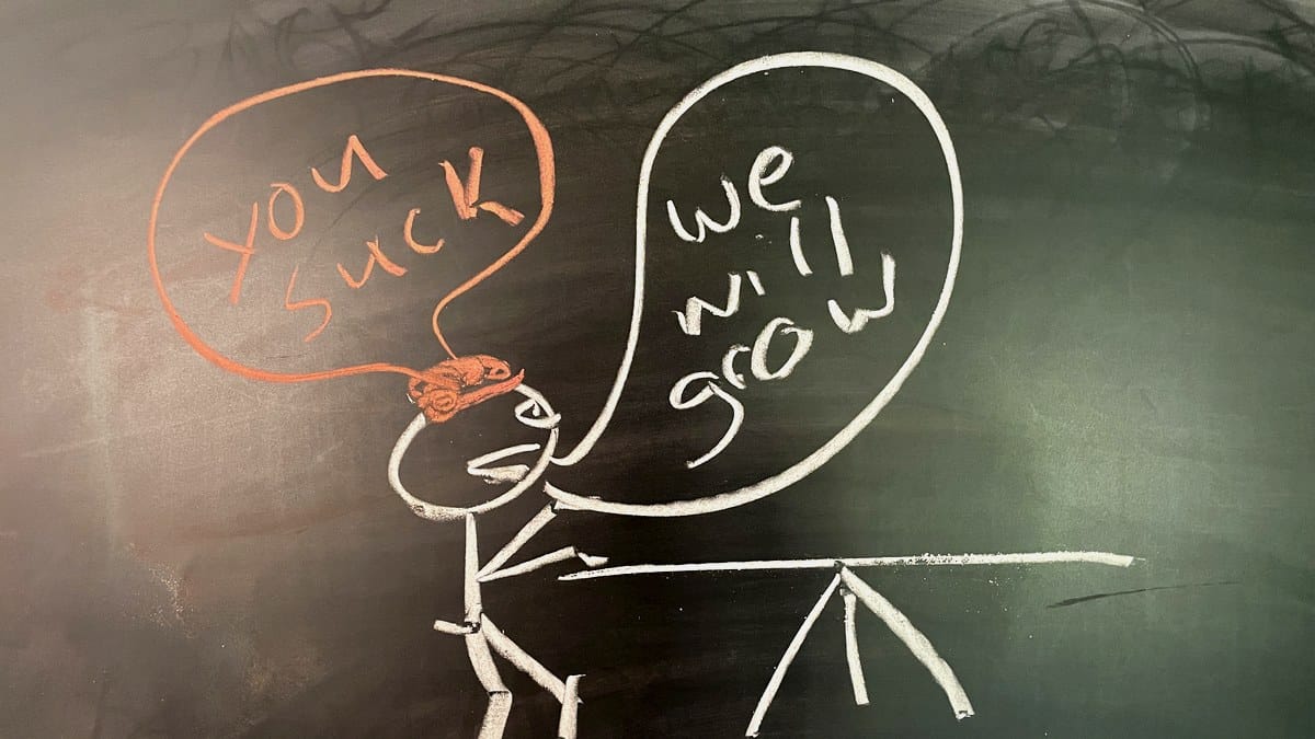 Chalkboard sketch of a thought bubble feeding into an org chart, chalk text reading the ceiling is the story on a black board.