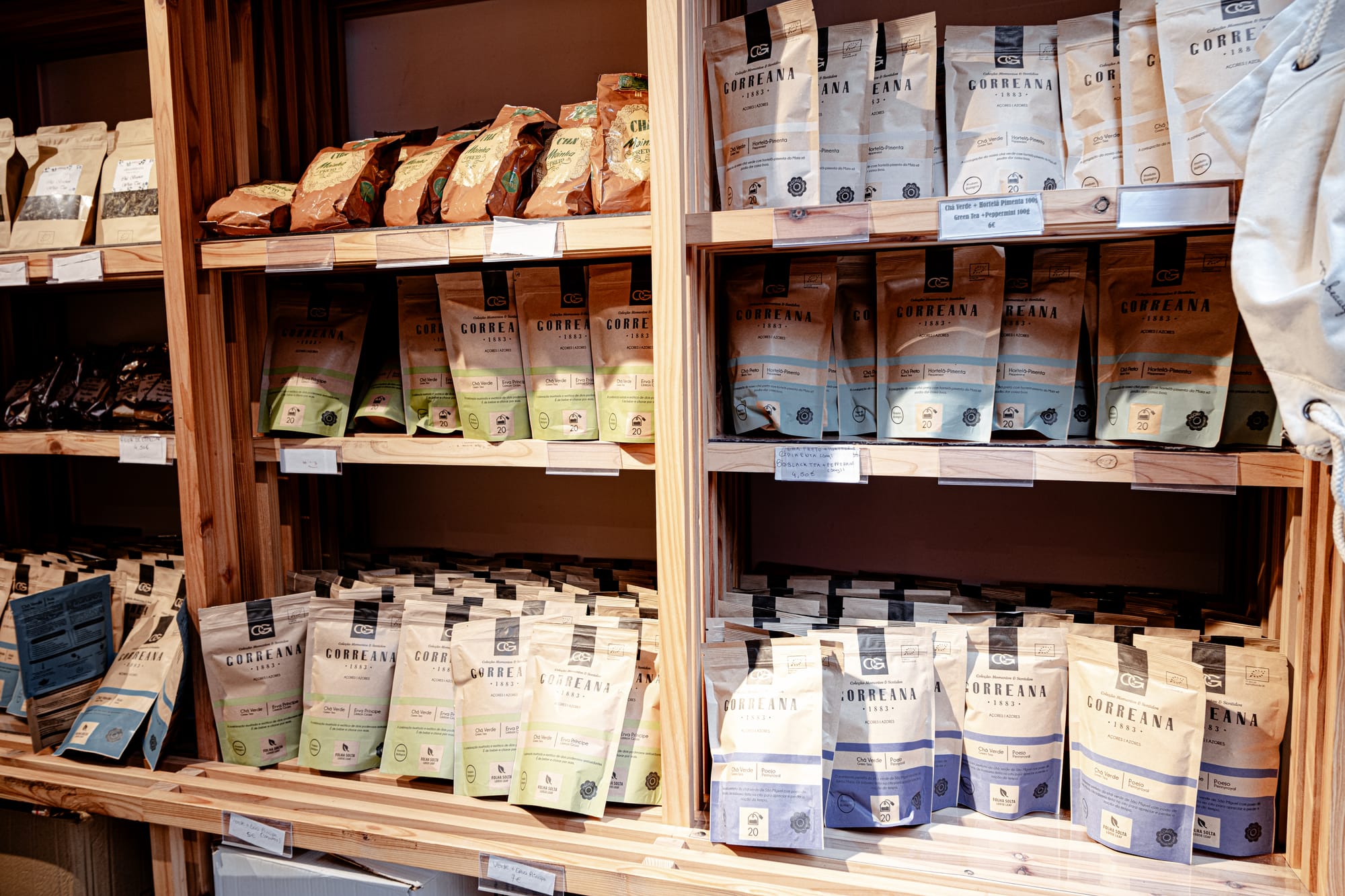 Shelves stocked with different tea products from Chá Gorreana