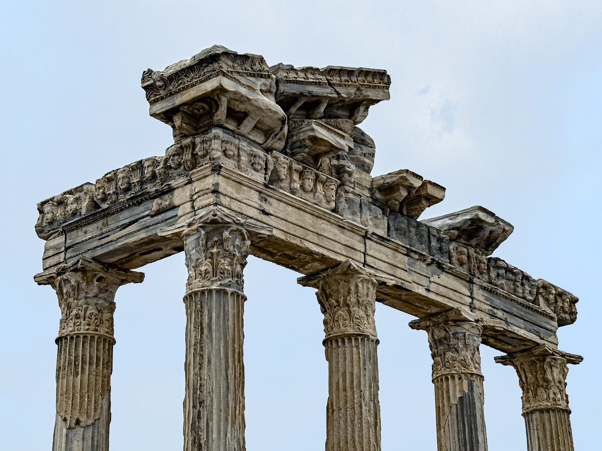 Close-up of the Corinthian columns and elaborate frieze of the Temple of Apollo in Side, Turkey