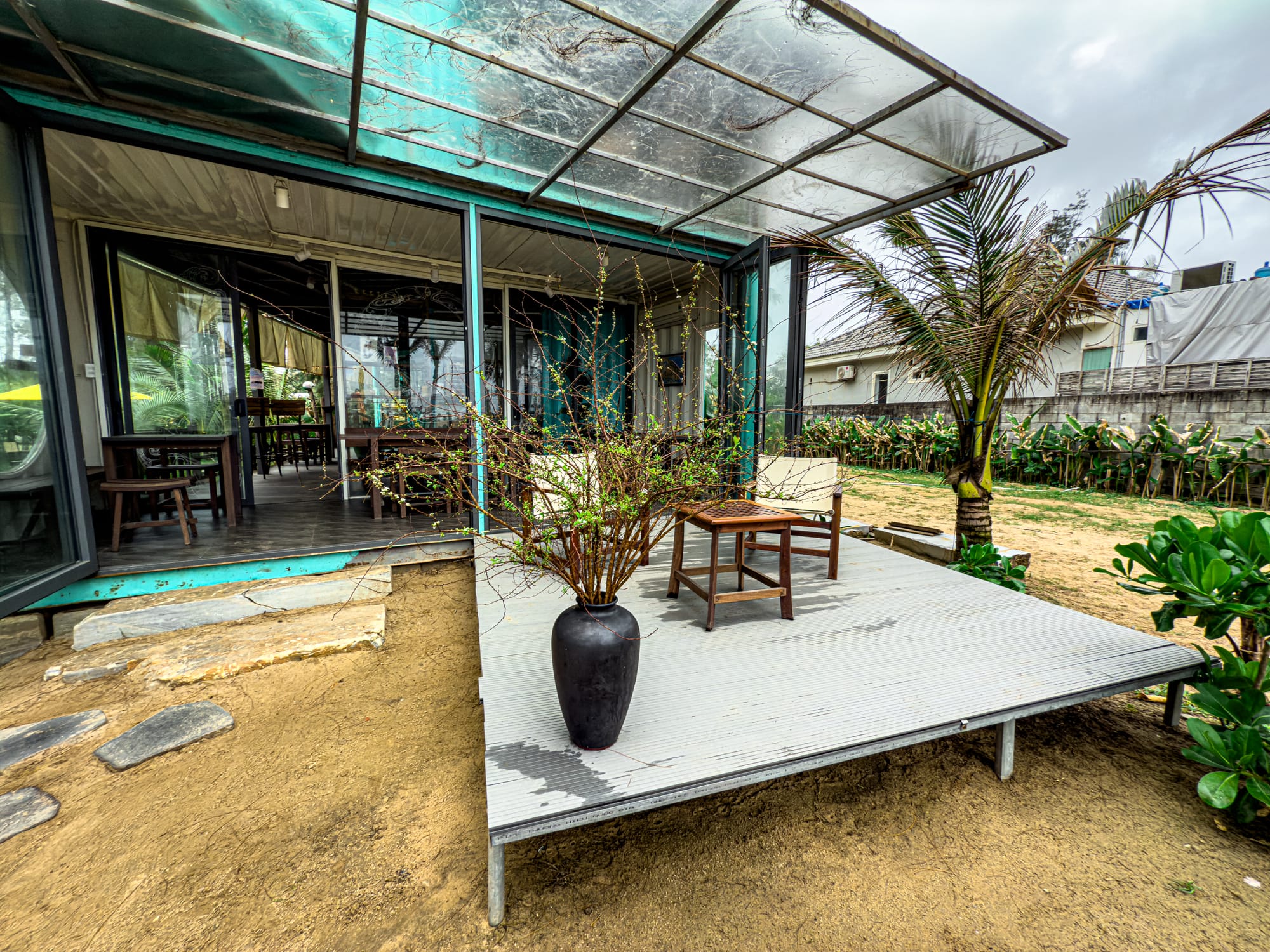 Outdoor seating area at Hít Hà Cafe Hội An coworking space for remote working and digital nomads