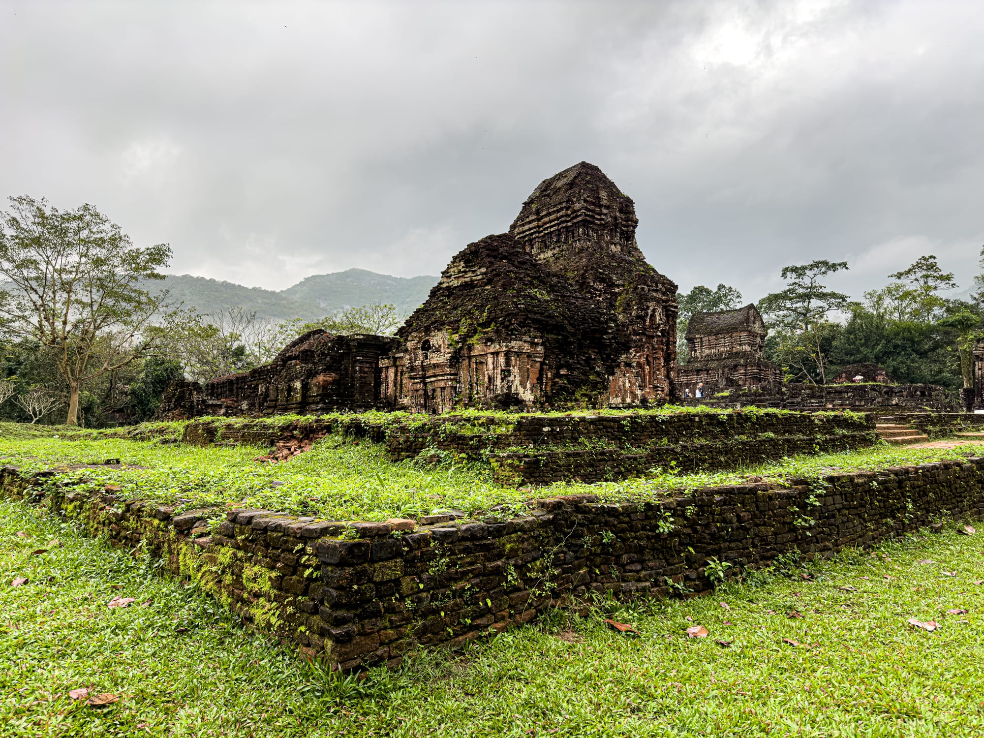 Ancient Cham temple ruins at Mỹ Sơn Sanctuary surrounded by lush greenery near Hội An, Vietnam