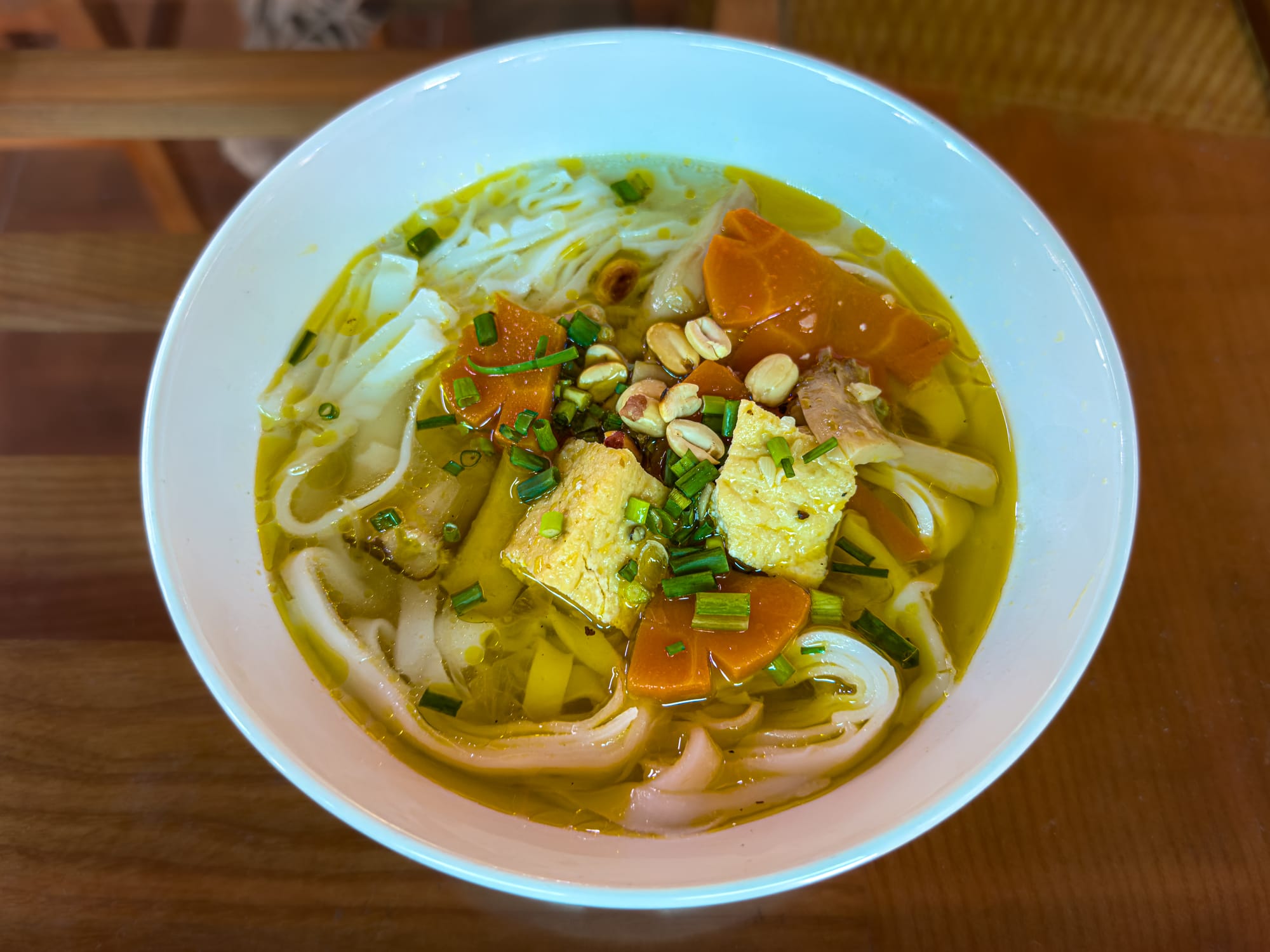 Vegan noodle soup with tofu peanuts and vegetables served after Mỹ Sơn Sanctuary tour near Hội An in Vietnam