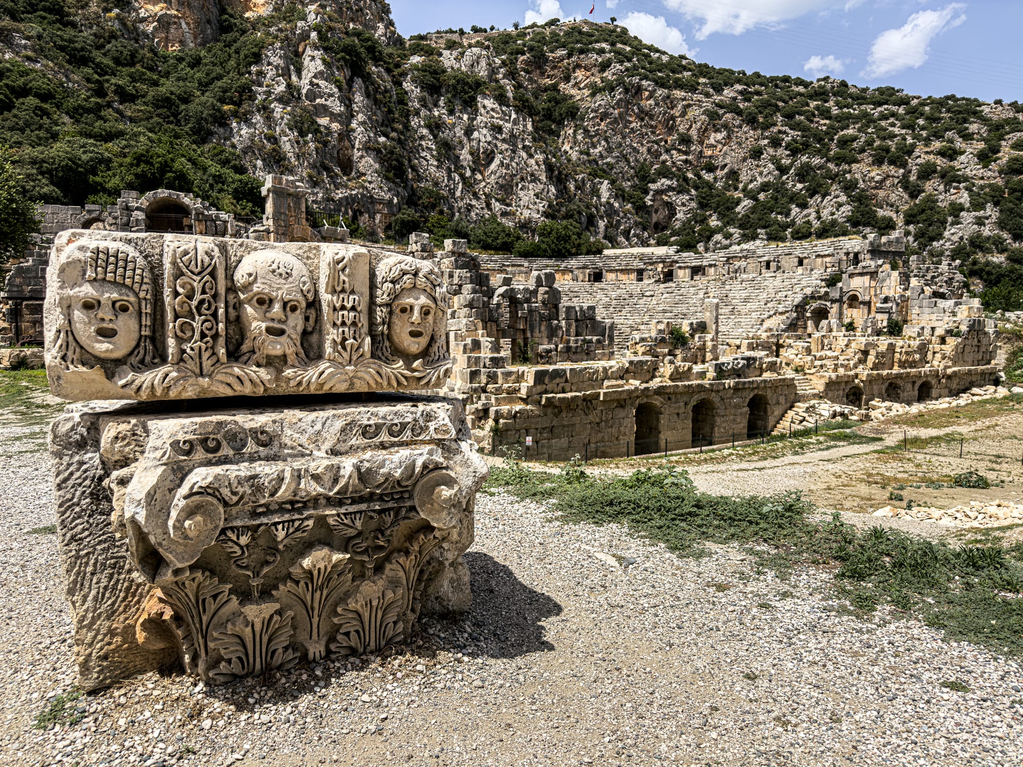 Ancient Roman amphitheater and theatrical mask frieze at Myra archaeological site near Demre, Antalya
