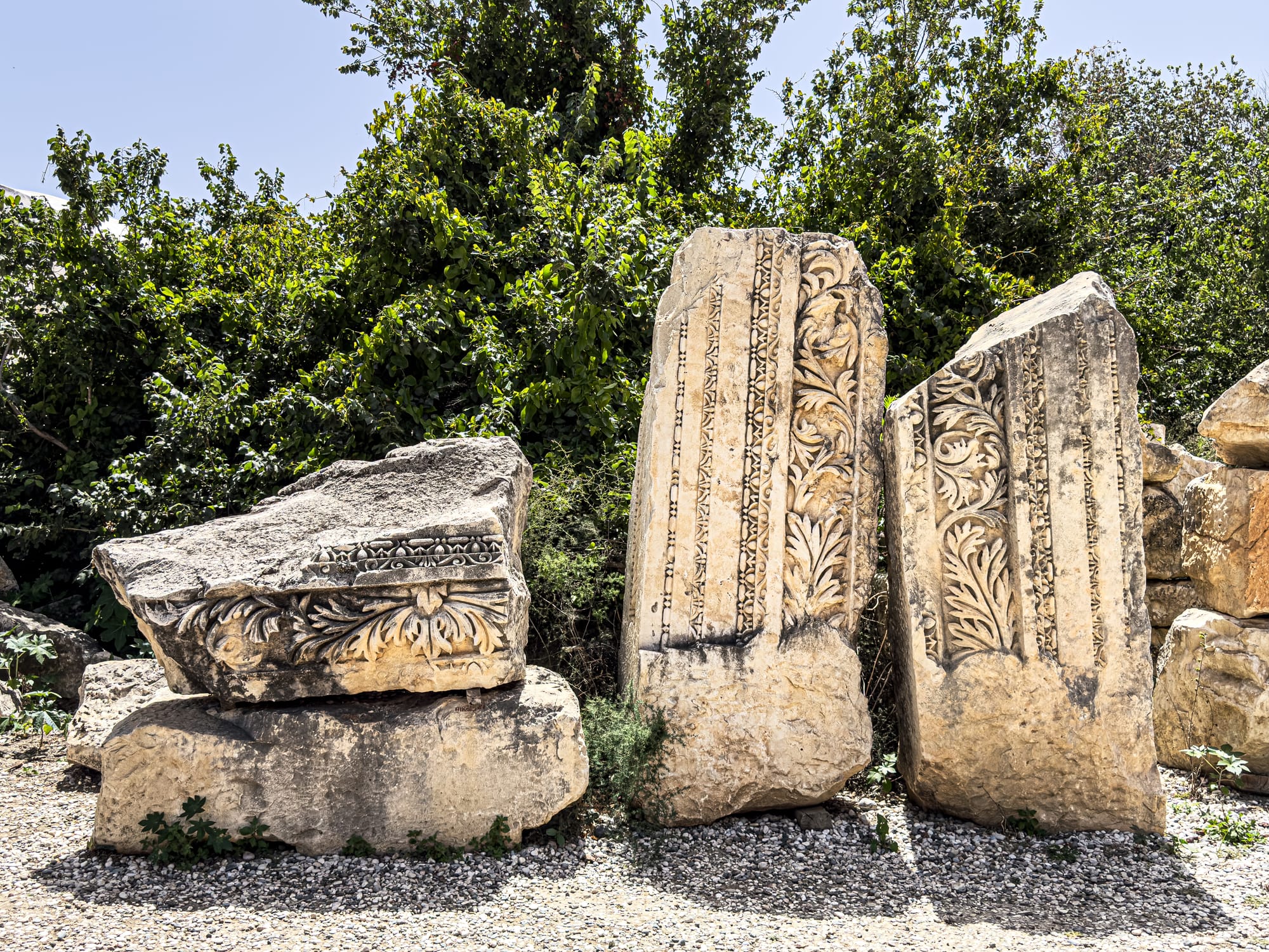 Ornate stone fragments with floral and vine carvings from the ancient Lycian city of Myra in Turkey