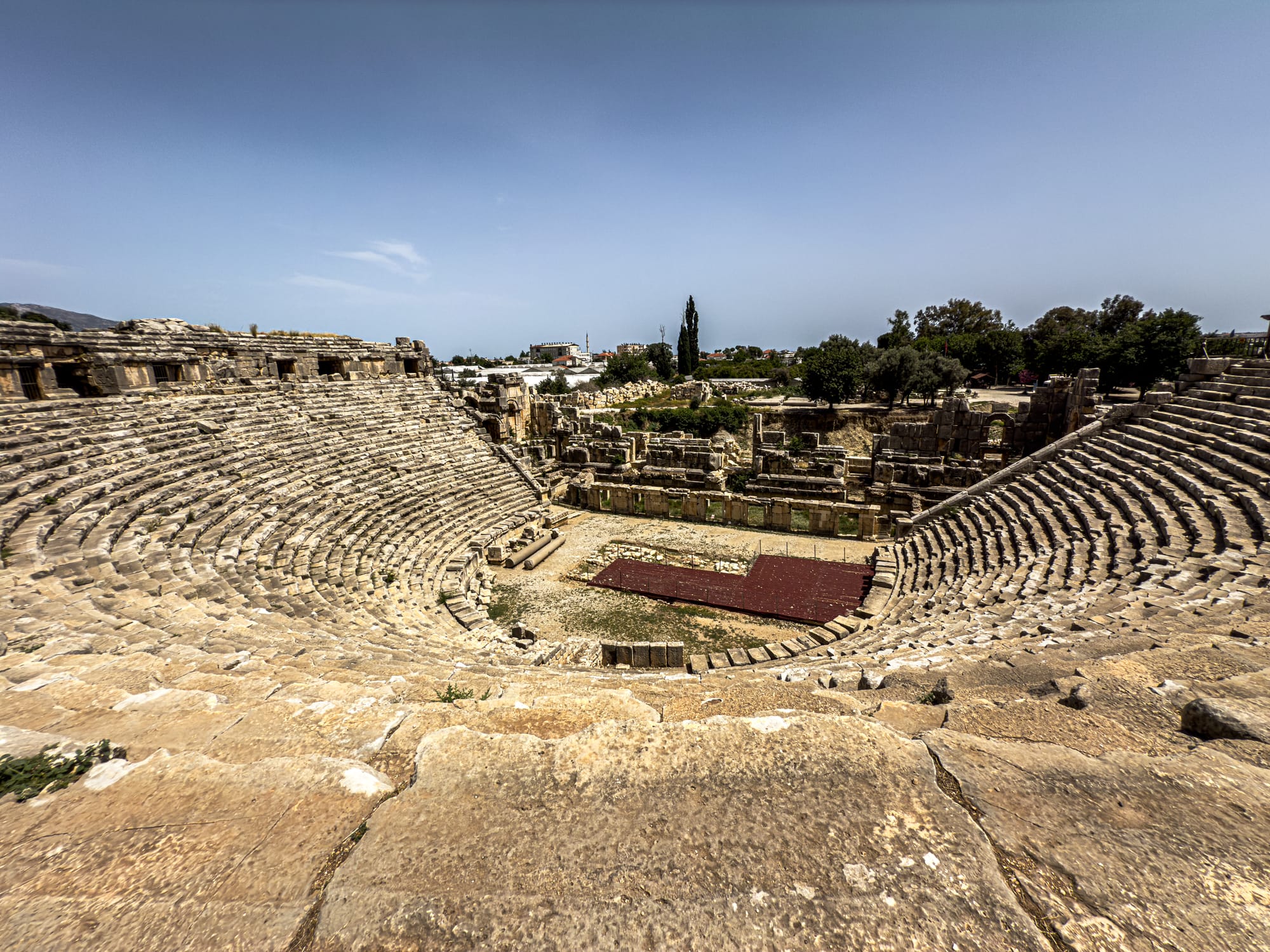 Roman amphitheater at Myra ancient city, with semicircular seating and stage