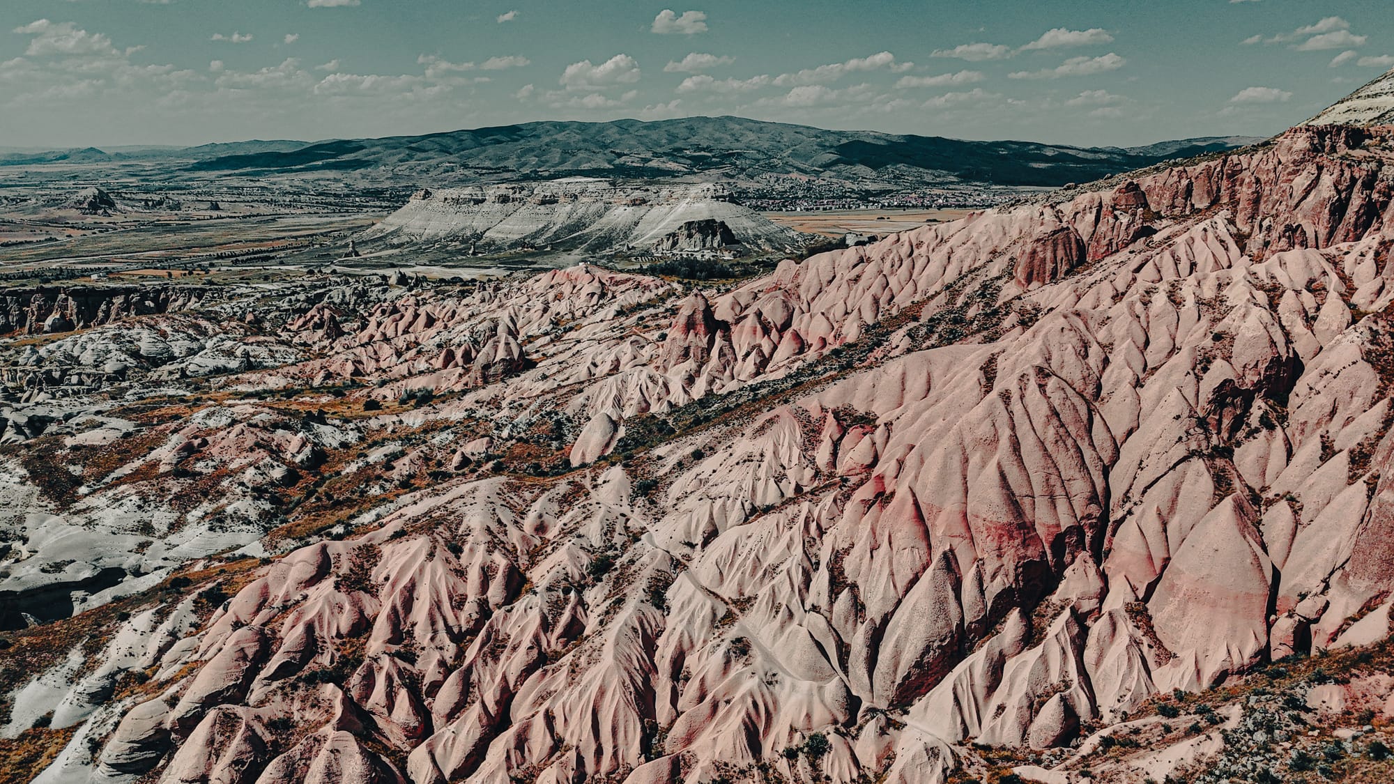 Aerial view of Red and Rose Valley ridges with pink and white rock formations