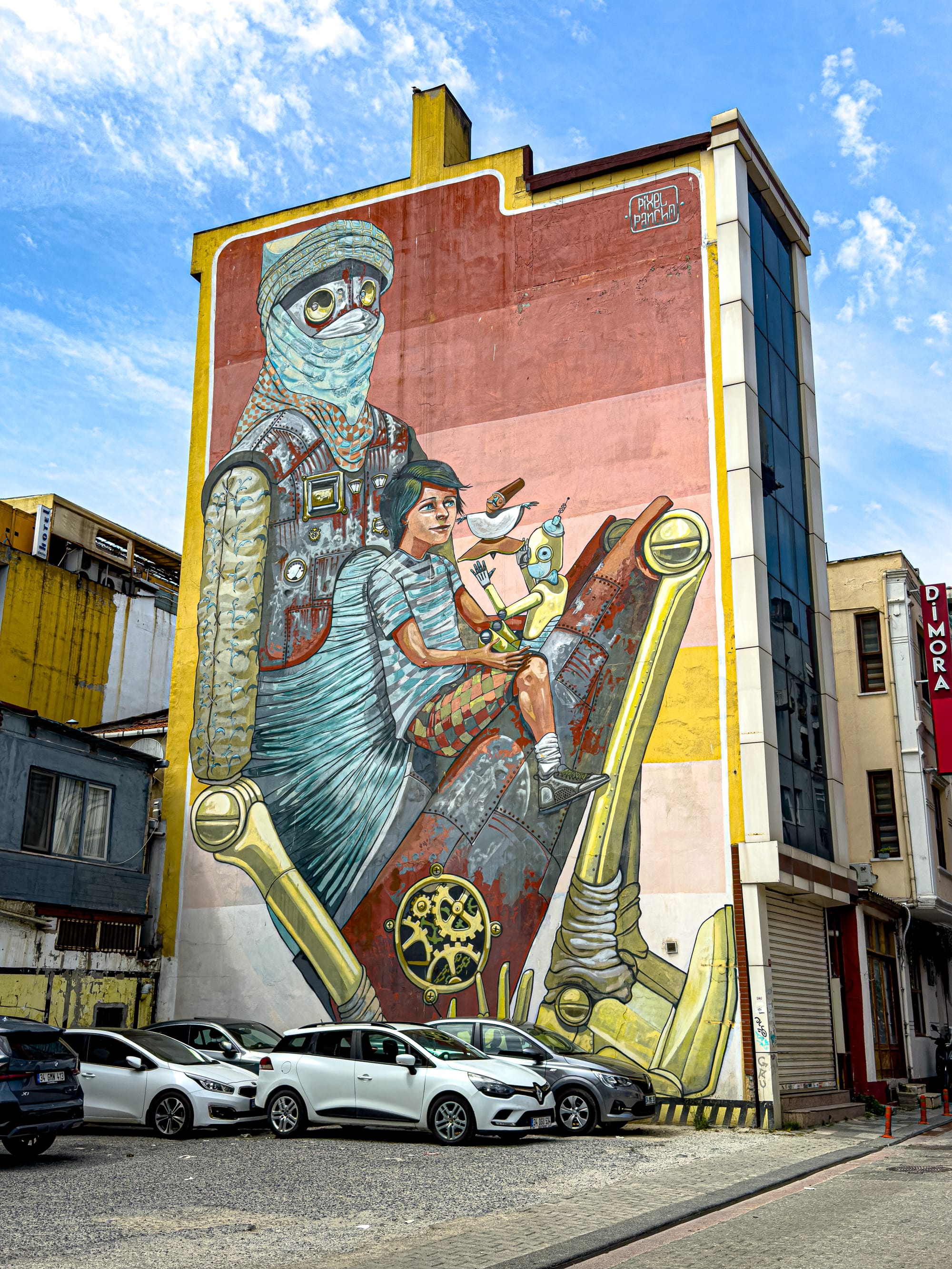 A colorful mural by Pixel Pancho showing a large humanoid robot with a bird-like face standing behind a child riding a mechanical creature, surrounded by birds and gears, painted on the side of a multi-story building