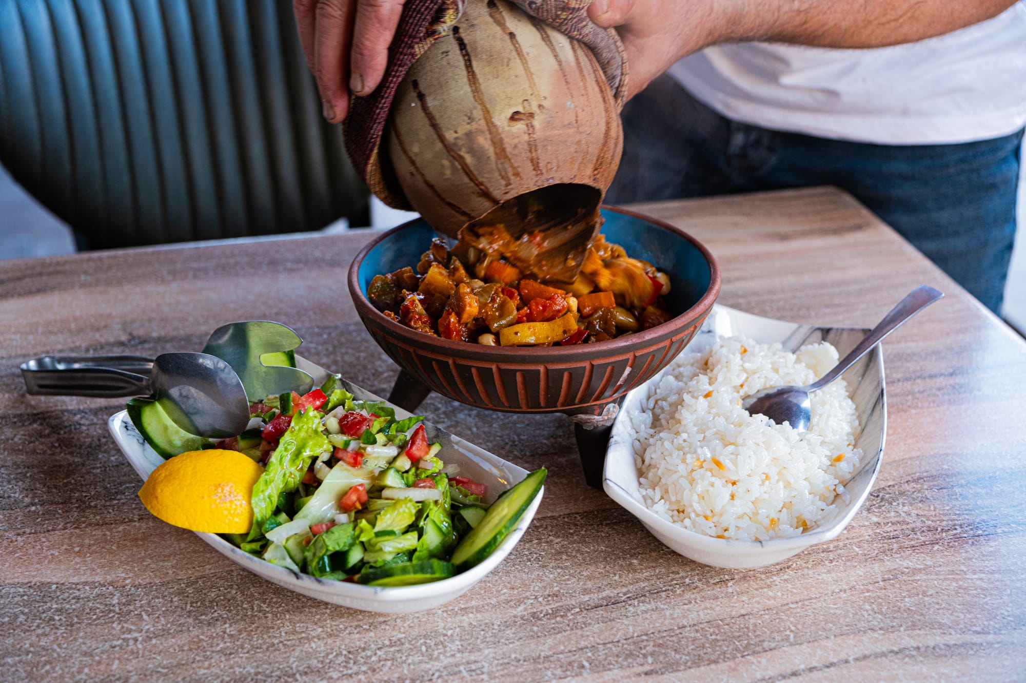 Special vegan clay pot at House of Memories, served with rice and a fresh salad