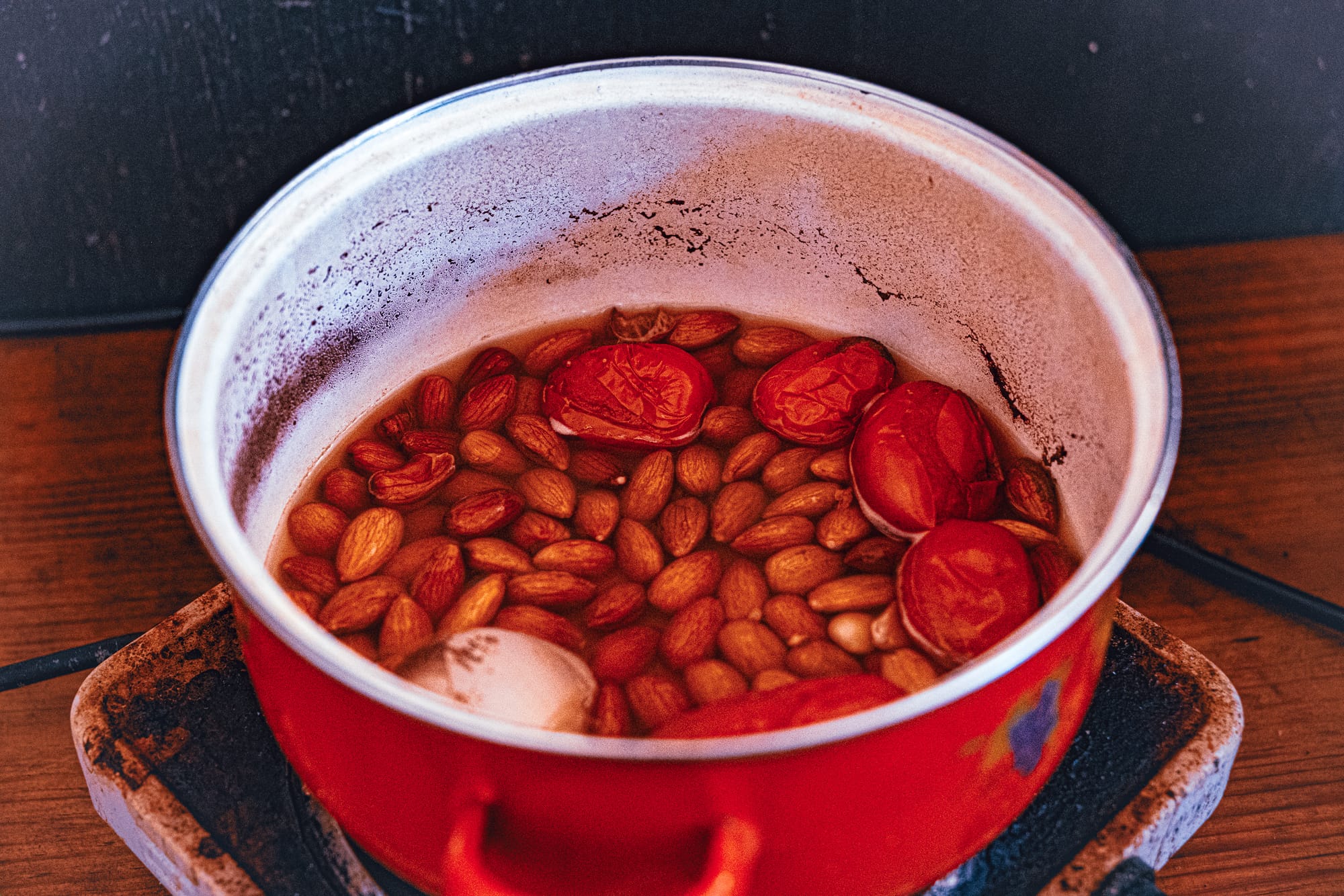 Almonds, tomatoes, and onion simmering in a pot at Art Libreria in San Cristóbal de las Casas, the base for the vegan queso used in their rajas con queso