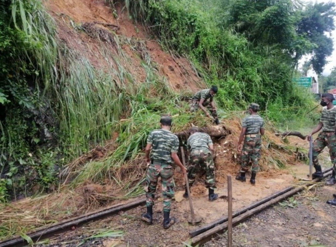 Sri Lankan security forces clearing a landslide and debris from a transport route after Cyclone Ditwa.