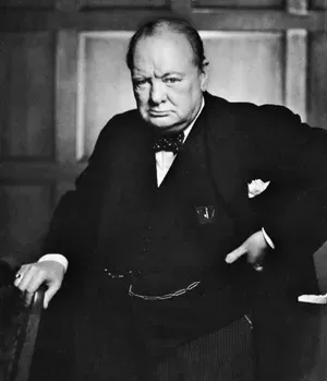 Winston Churchill stands before the Union Jack, his face half-lit — symbolizing how charisma can obscure cruelty.