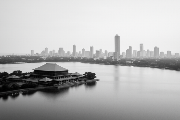 Black-and-white aerial view of Colombo’s central cityscape.