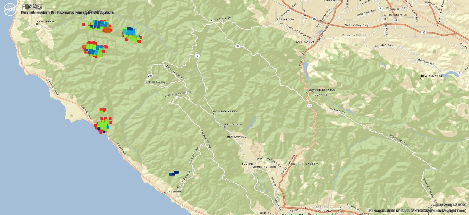 The map, with 4 slightly bigger clusters of red, green, and blue dots.