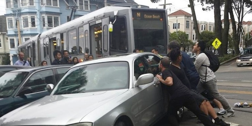 Car Blocking Muni Moved by Riders