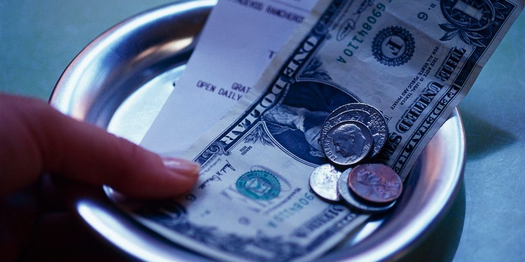 Is a Mandatory Dining Surcharge Better Than Tips?