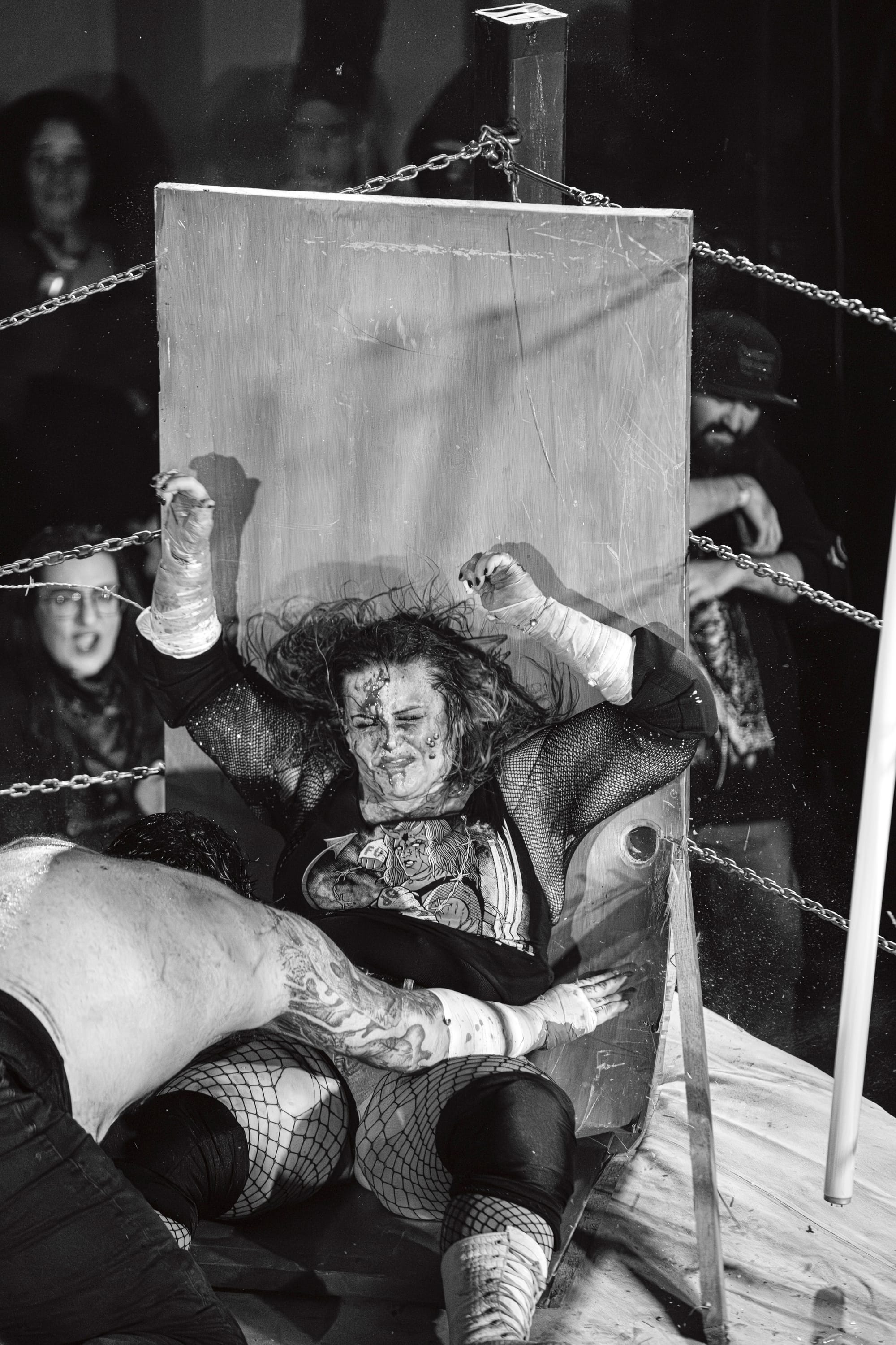 The fighter Vixsin is pictured in a deathmatch wrestling event