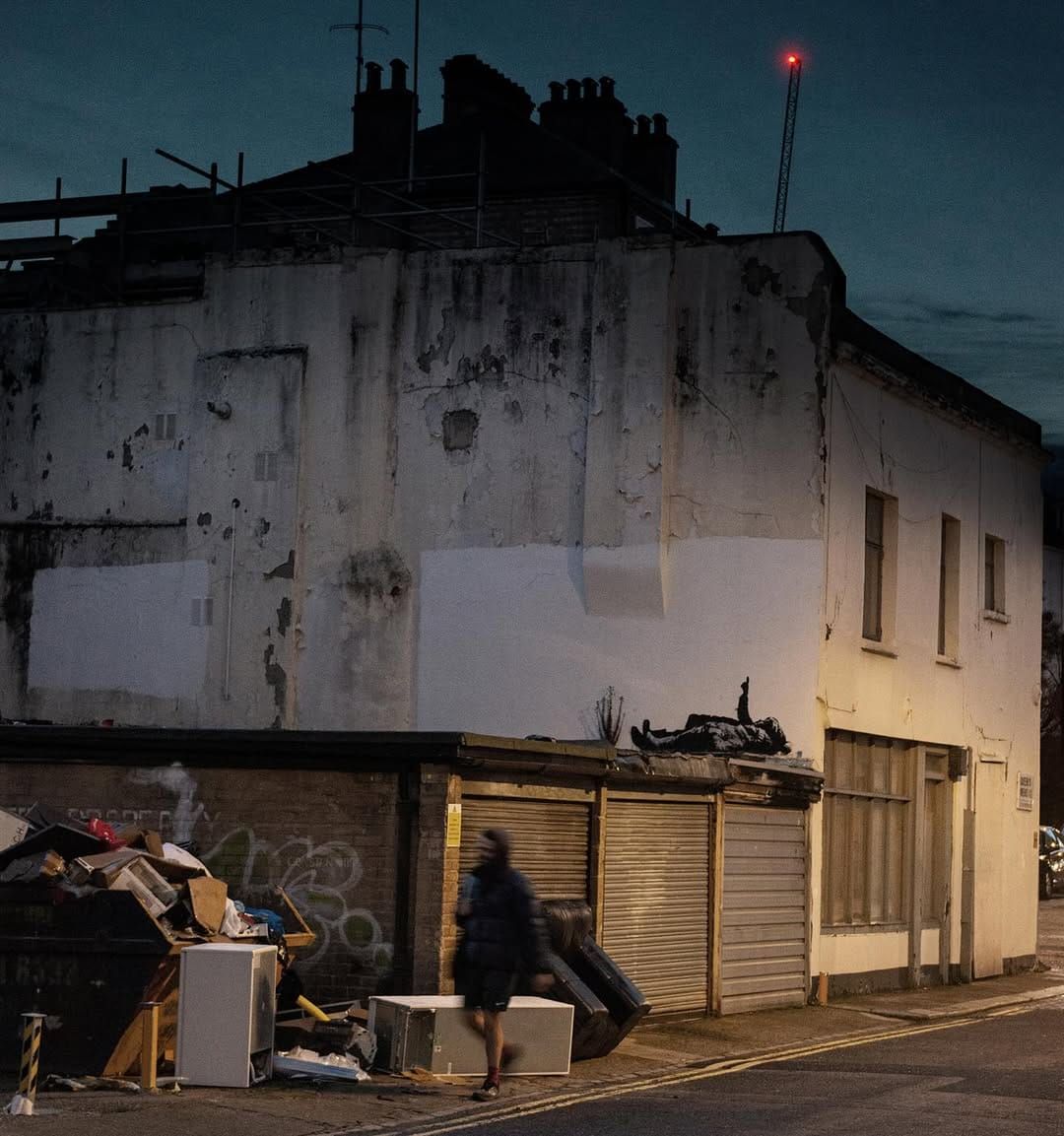 Banksy debuts new mural in London as The Walled Off Hotel reopens in Bethlehem