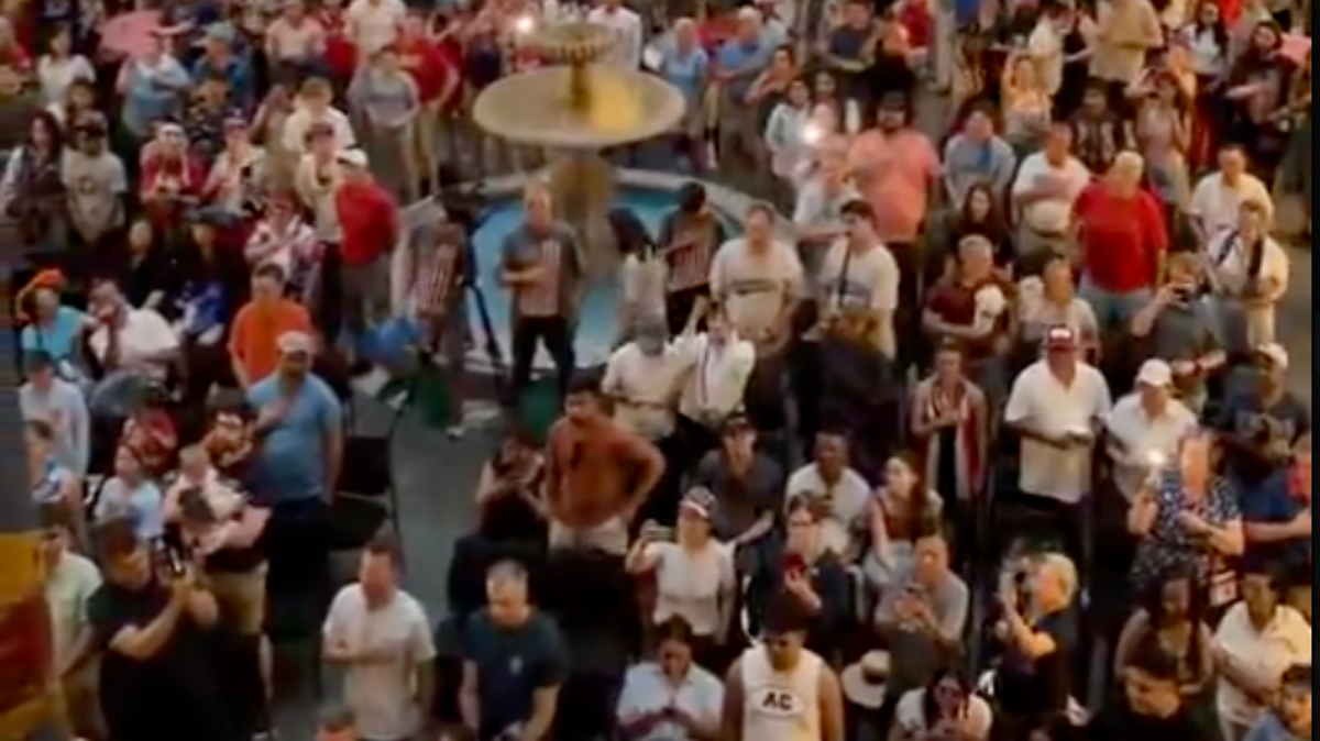 Evacuated Trump supporters shelter from thunderstorm in African American museum