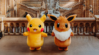 Pokémon mascots Pikachu and Eevee stand inside London’s Natural History Museum during a Pokémon pop-up shop collaboration.