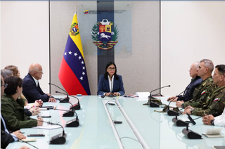 Venezuela’s Vice President Delcy Rodríguez, designated acting president by the Supreme Tribunal of Justice, chairs a meeting with senior officials in Caracas