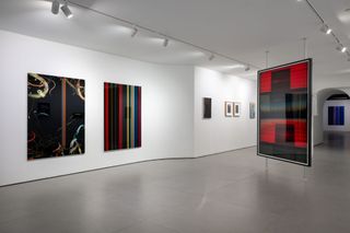Larger, scanner-based photo works by the artist Gao Yutao are seen on the white walls of a gallery space