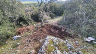 An illegal dig site is pictured in Greece