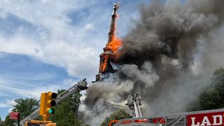 fire and smoke billow from a church steeple in brooklyn