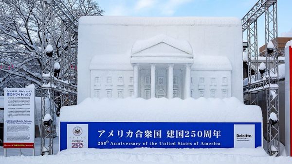 A snow and ice sculpture of the White House is seen in Sapporo, Japan, for the 250th anniversary of the United States of America