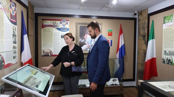 A staff member at the War Museum of the Boer Republics in Bloemfontein shows archival materials to a representative of the Russian Embassy in South Africa