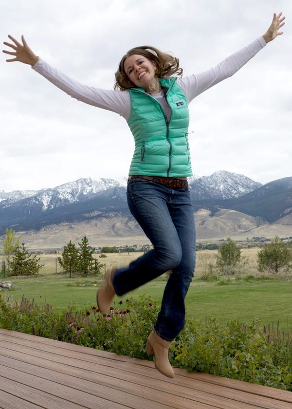 Katie Jumping in Mountains