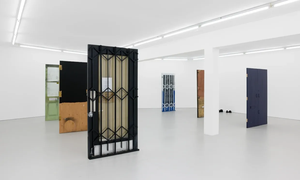 A series of doors featured in Fiona Connor's Closed Down Clubs exhibitions