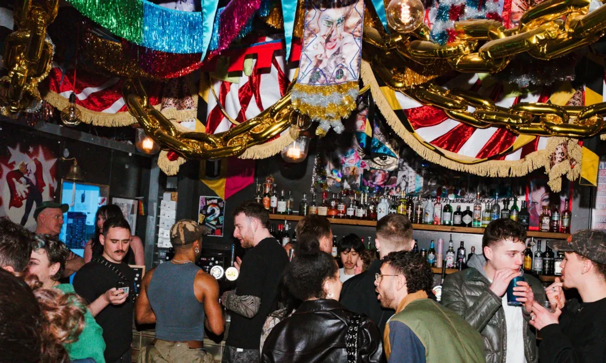 The Divine bar, with decorations draped on the ceiling.