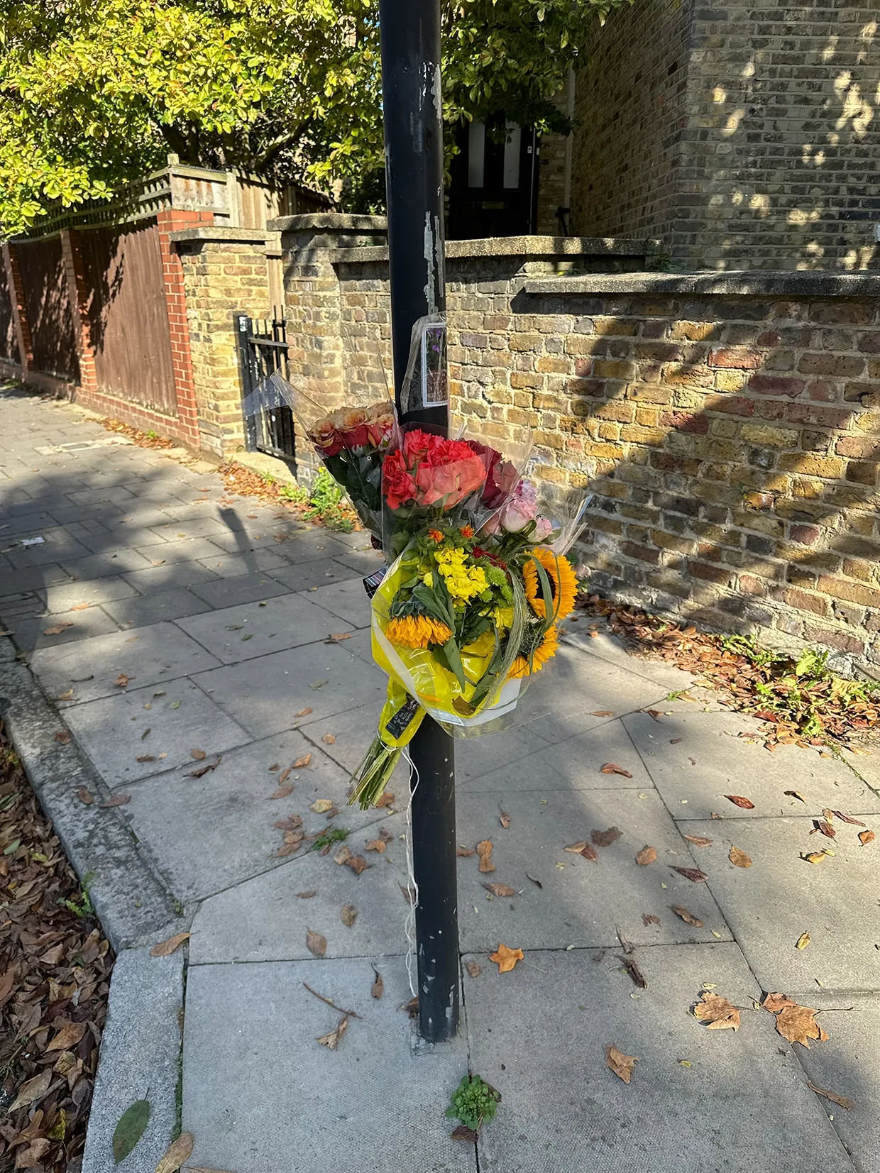 Photograph of flowers placed for the 25th anniversary of Harry Stanley's death