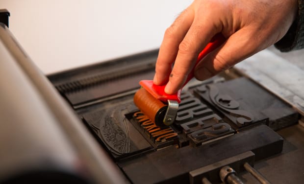 Rolling with the times: Russell Frost gets ready to make a print. Photograph: Eleonore de Bonneval