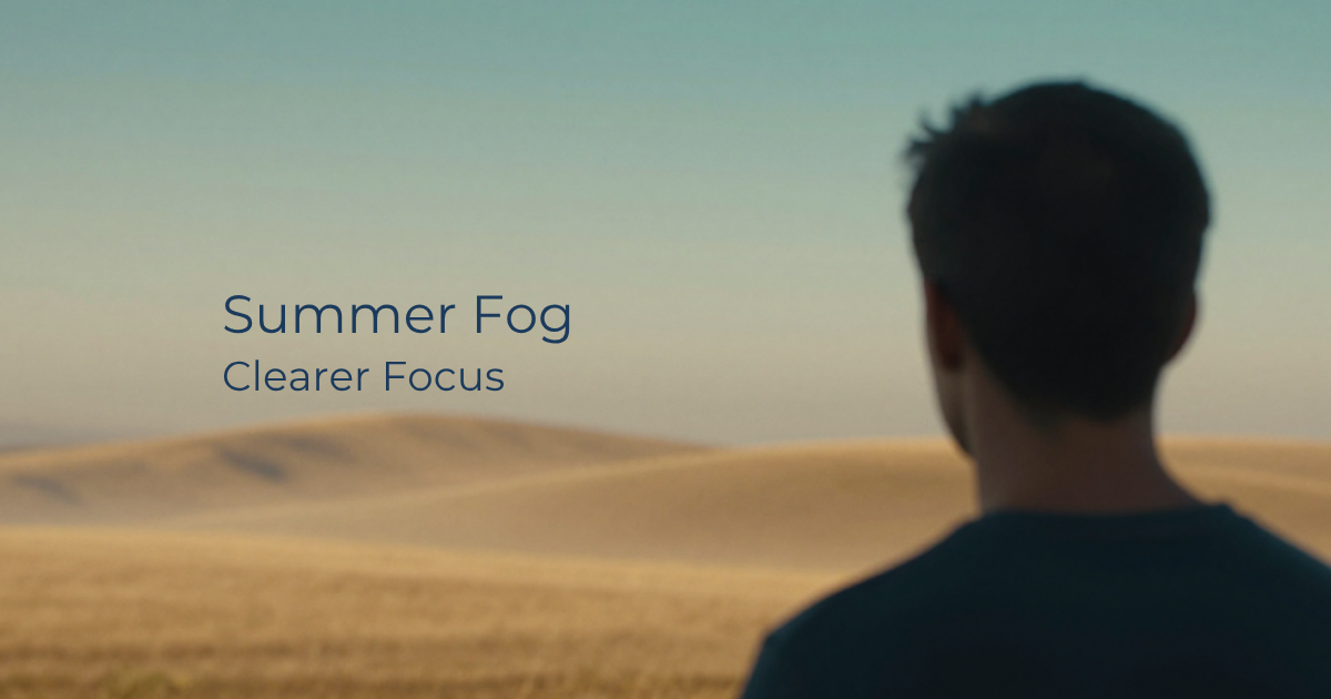 Illustration of a human head in profile shown as a hazy summer horizon with heat lines and a low sun, in navy, teal, and amber, with text reading "Summer Fog, Clearer Focus."
