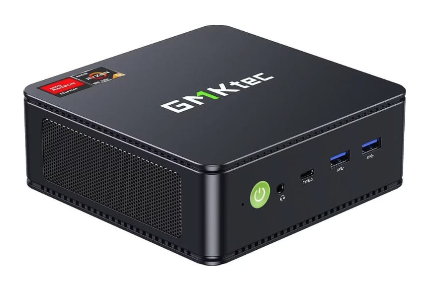 A GMKtec Ryzen mini PC, closed, with its AMD Ryzen badge visible on the lid — one of the two used as K3s server nodes in this build.