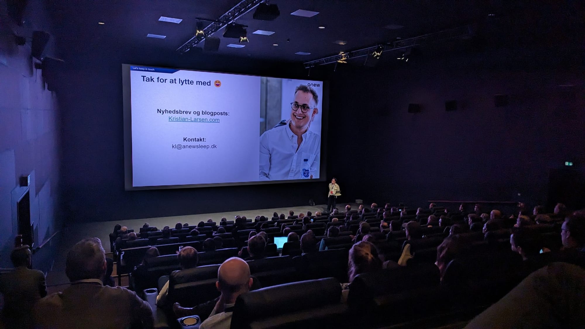 Kristian presenting at a conference