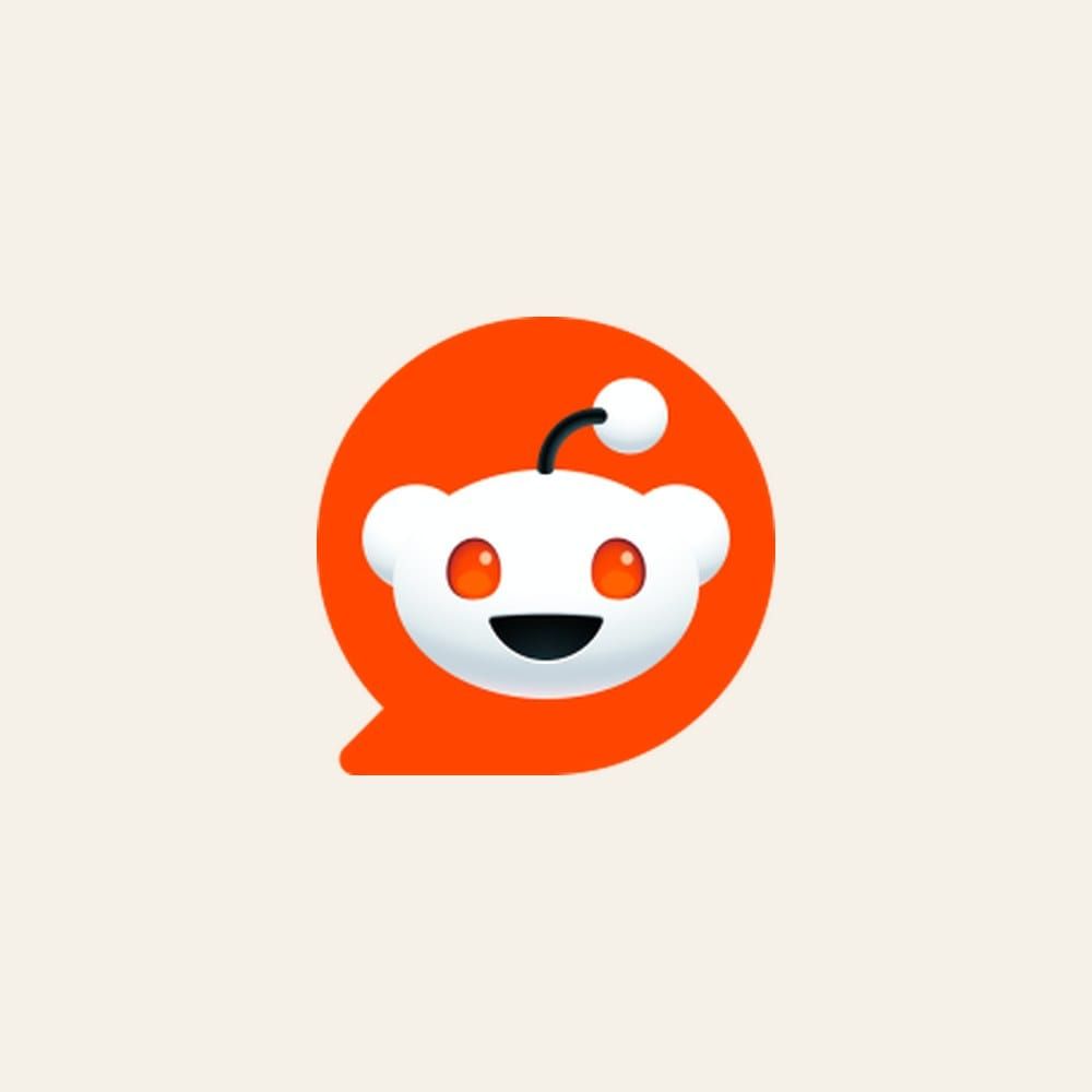 Reddit logo on cream background