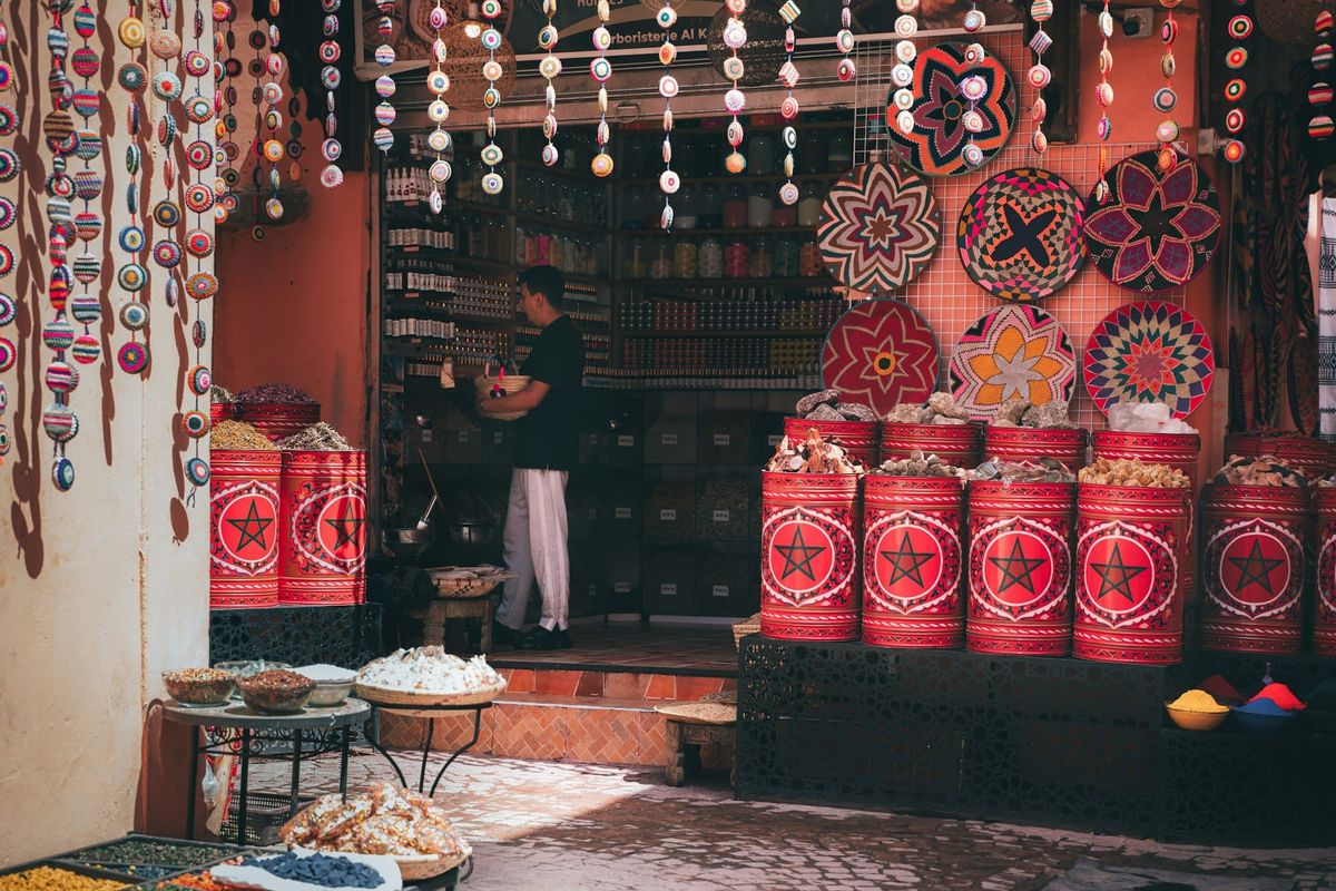 Traditional spice shop with colorful displays, representing specialty grocers that carry mastic gum