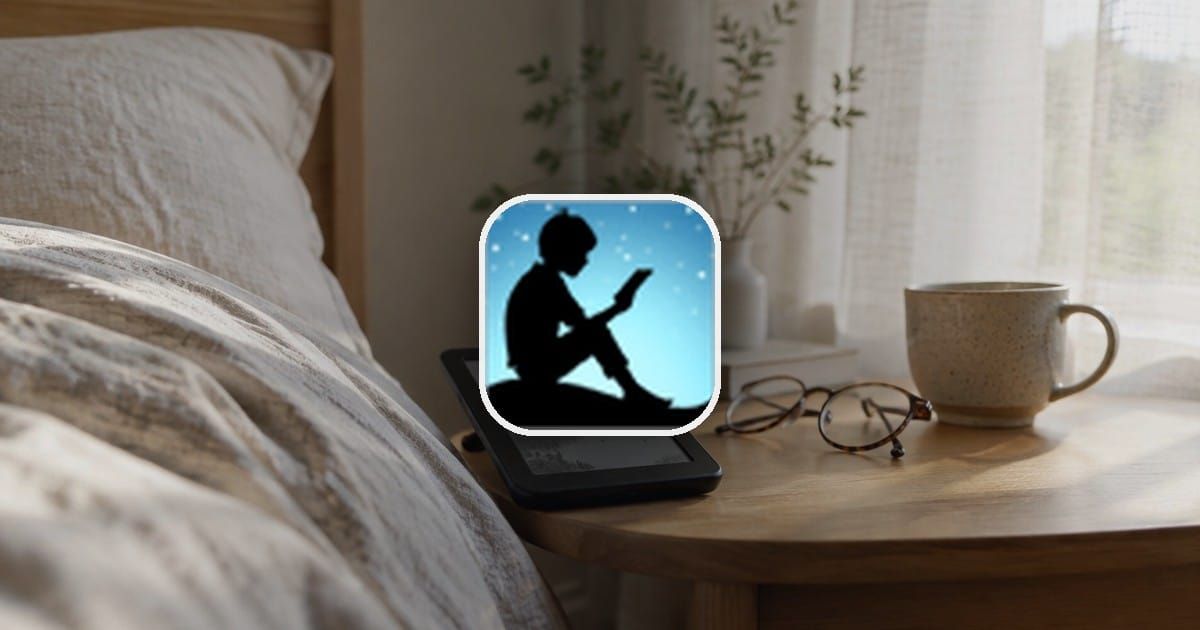 An e-reader on a bedside table with the Kindle logo