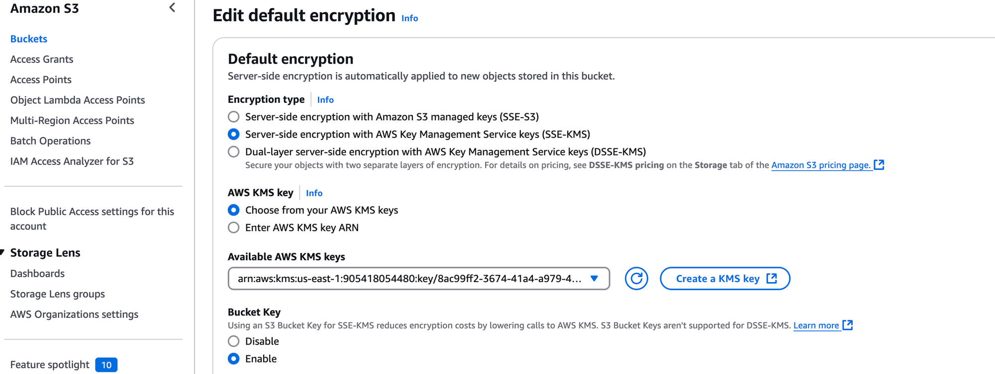 AWS S3 bucket properties showing default encryption enabled with AWS KMS customer managed key