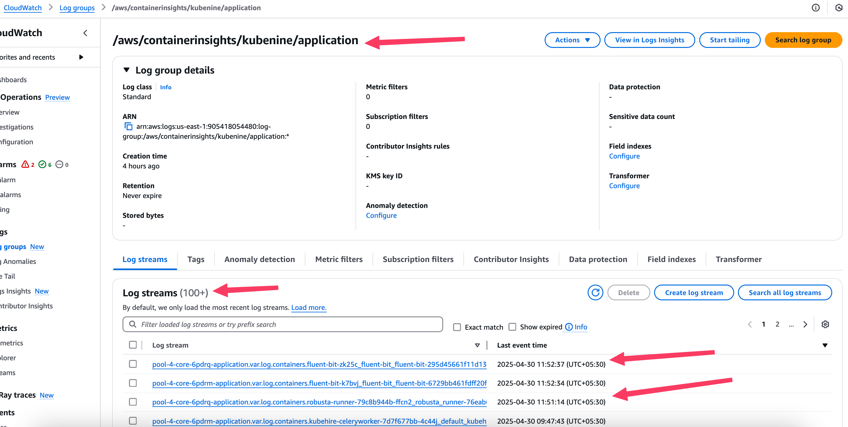 AWS CloudWatch Logs console displaying log groups and log streams received from EKS via Fluent Bit