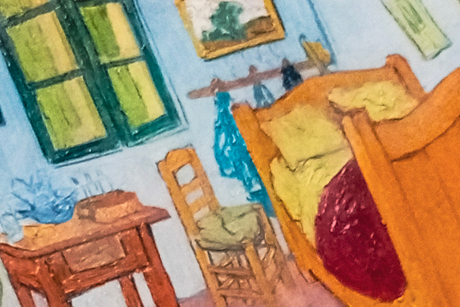 The Bedroom by Vincent van Gogh, a simple interior scene with bold colors and distorted perspective reflecting intimacy and solitude.