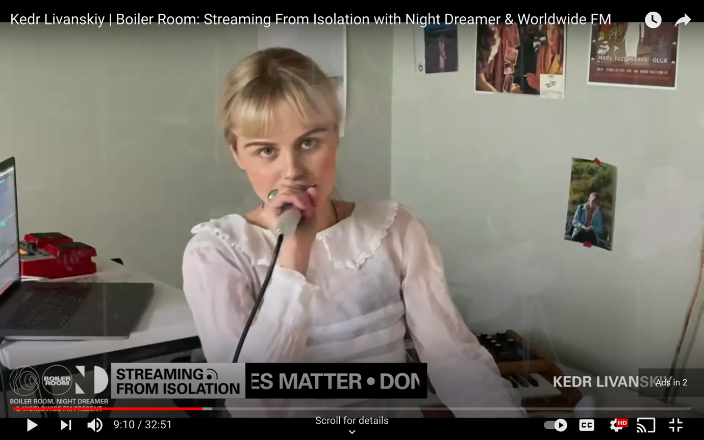 A picture containing text, person, indoor, wall Description automatically generated