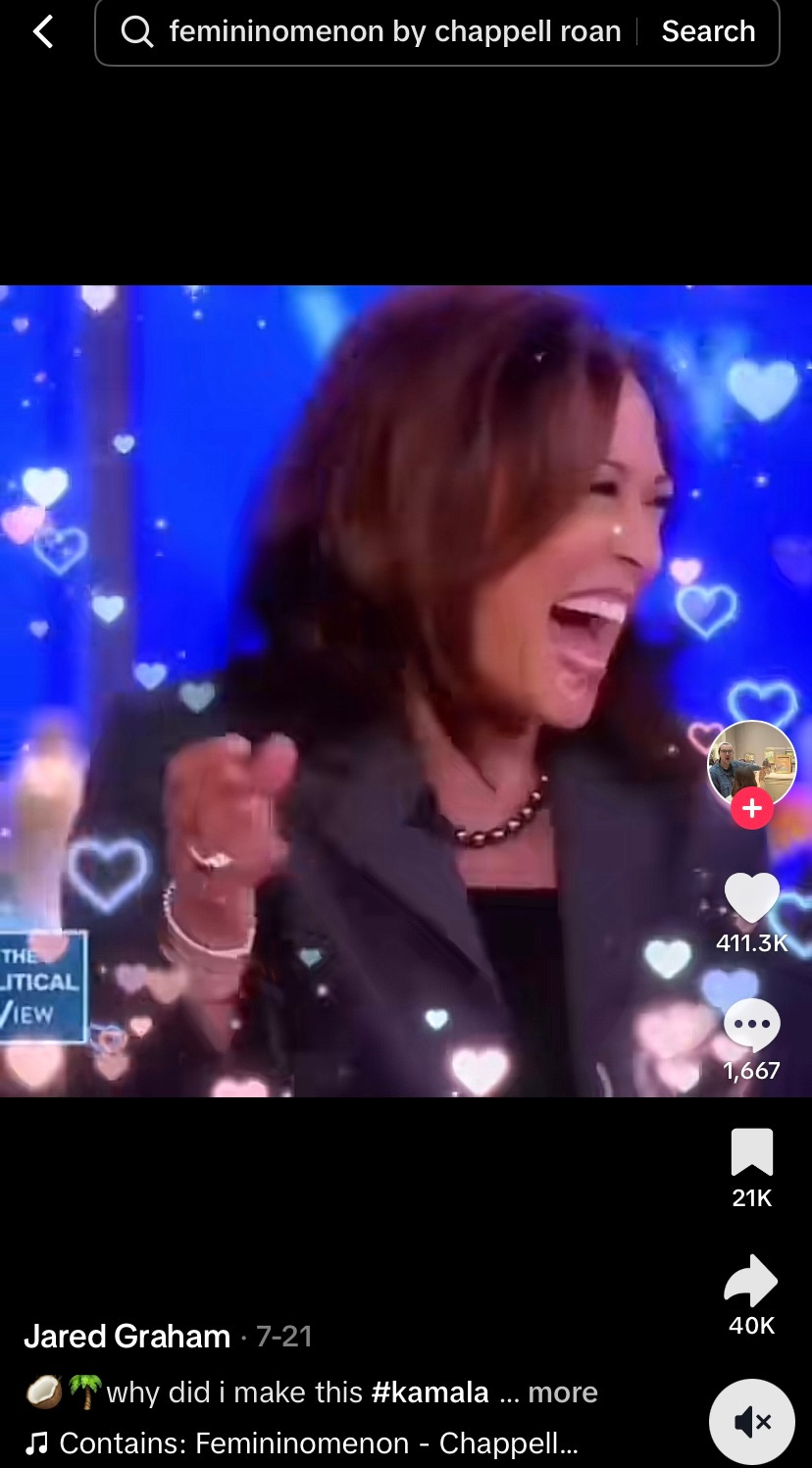 a screenshot of a tiktok that has a “fancam” of Kamala Harris set to a popular song by Chappell Roan. The media features Kamala laughing, dancing, and reiterating her famous “you think you just fell out of a coconut tree?” memeable phrase. it has over 400,000 likes on TikTok, an app that skews younger in its userbase. Chappell Roan is a popular singer and songwriter, coming into huge proportions of fame in the last few months of 2023 and in the summer of 2024.