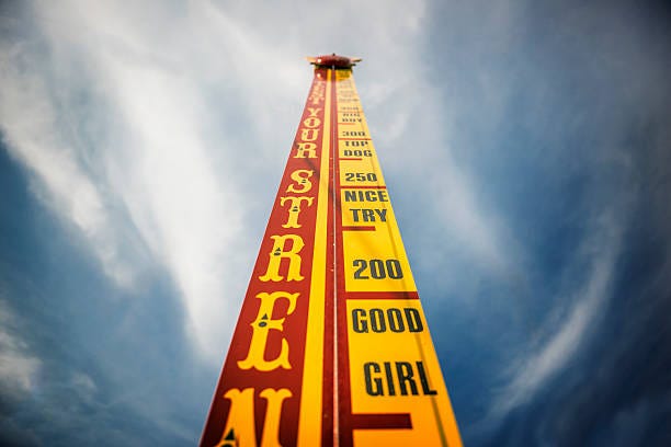 Strongman High Striker Carnival Game Stock Photo - Download Image Now - Traveling Carnival, Leisure Games, School Carnival - iStock