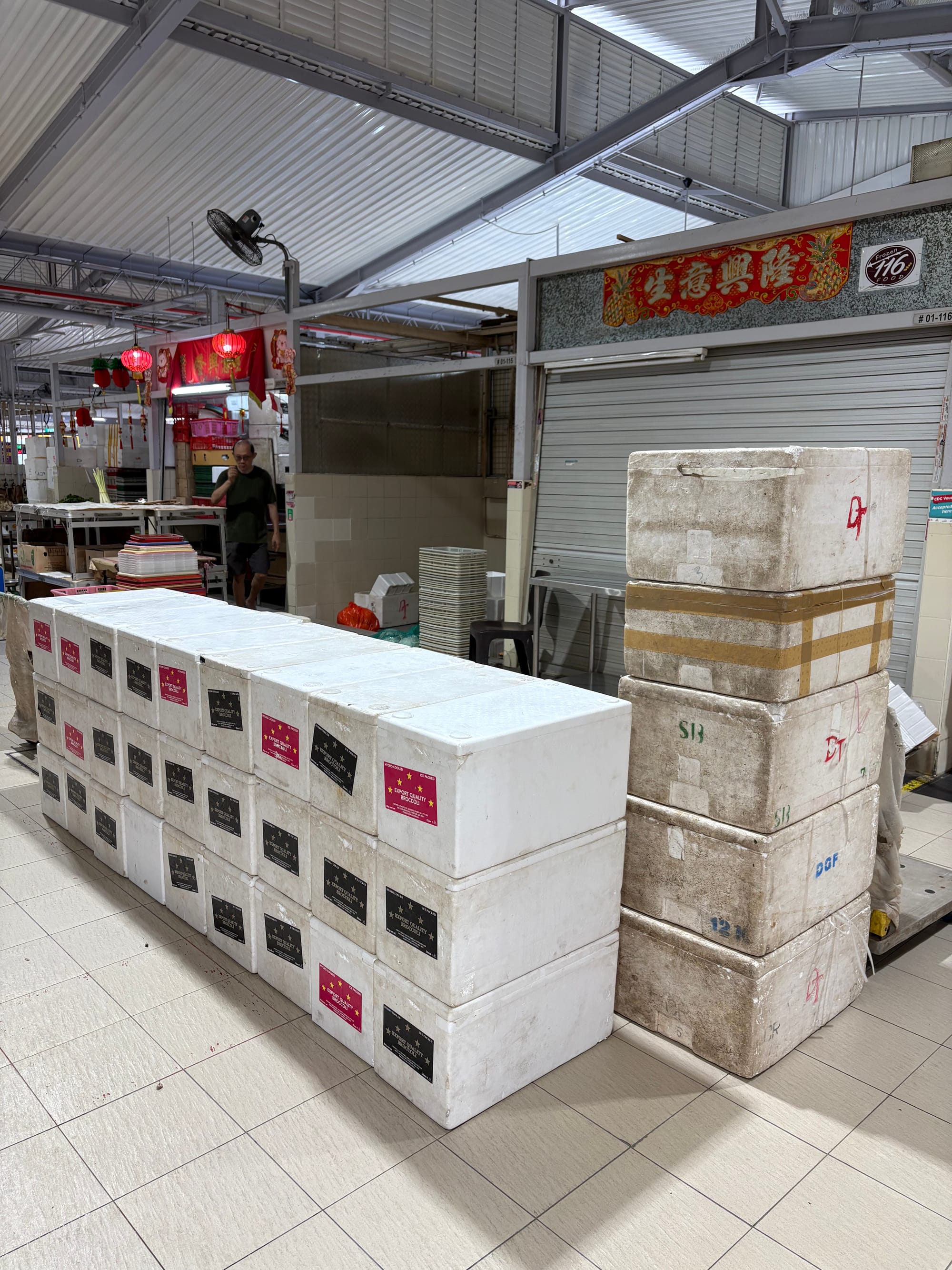 Styrofoam boxes are neatly stacked up to form walls.