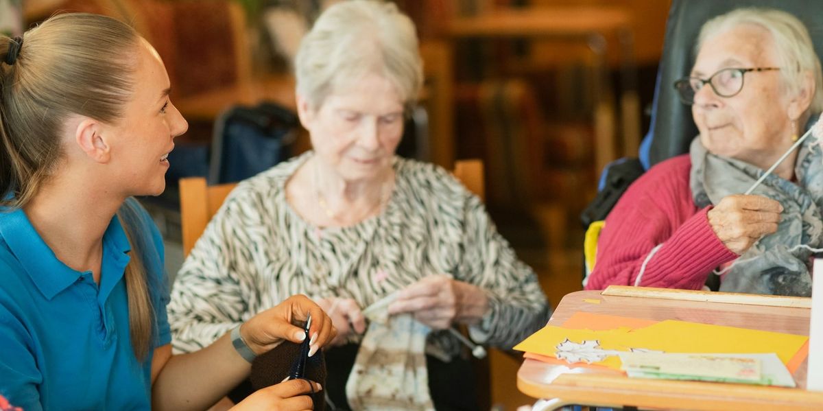 a care home caregiver with 2 older women with dementia and dysphagia 