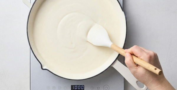 creamey tater tot casserole dysphagia recipe. white pot on a stove 