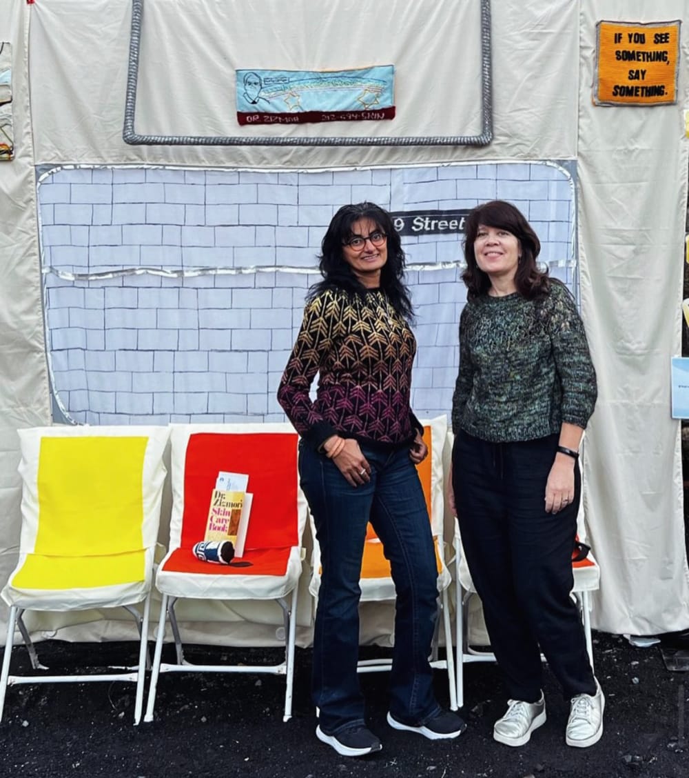 Karima Sundarji and Sue Hunter standing at the Straphanger's Lounge